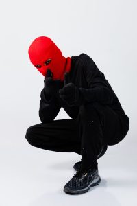 model posing in ski mask