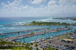 aerial view of scenic harbor with yachts and ocean
